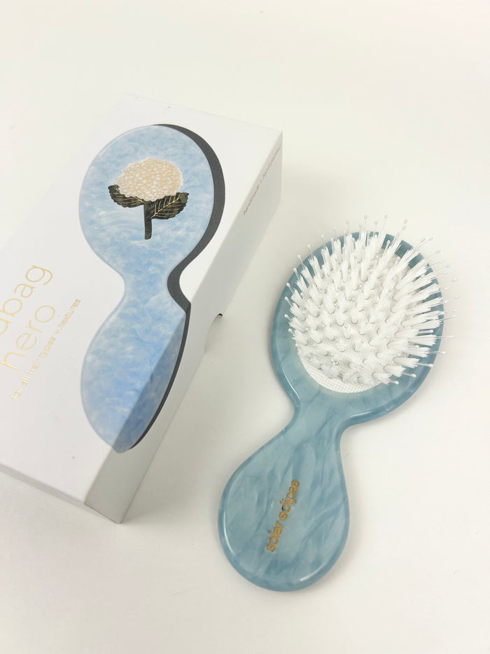 Solar Eclipse Hydrangea Hero Brush Hair Accessories in at Wrapsody