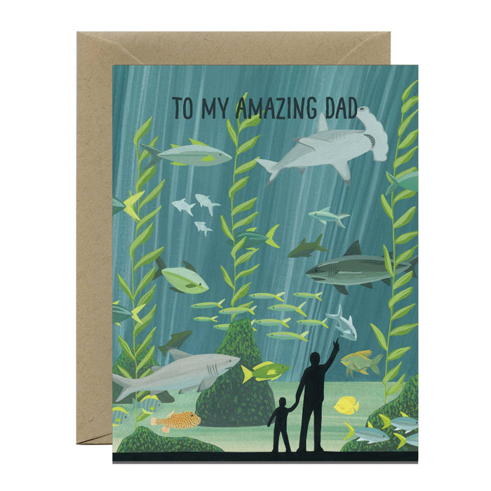 Greeting card with underwater scene, fish, and silhouette of a man and child, with 'To My Amazing Dad' text.