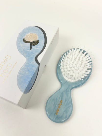 Solar Eclipse Hydrangea Hero Brush Hair Accessories in at Wrapsody